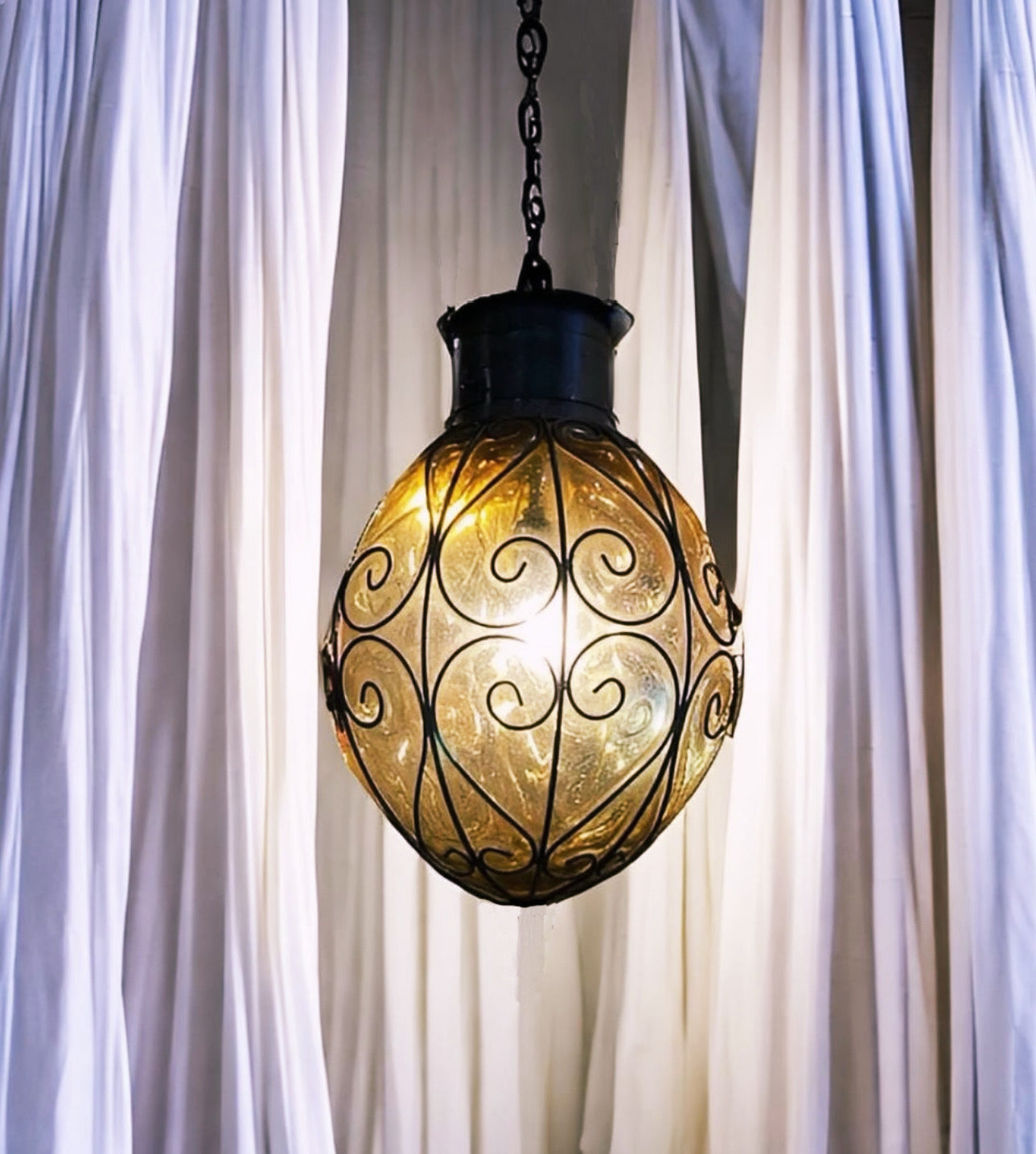 Hand Blown Glass and Iron Melon Light Pendant.