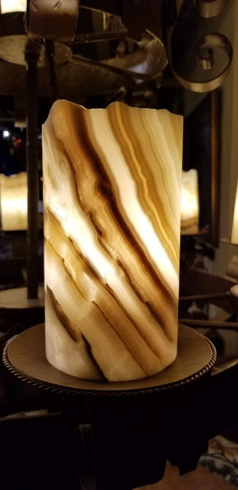 Onyx cylinder 7" x 4". 4" diameter x 7" tall onyx stone cylinder. No electrical. Made for candles or bulbs. Open on the top and bottom.